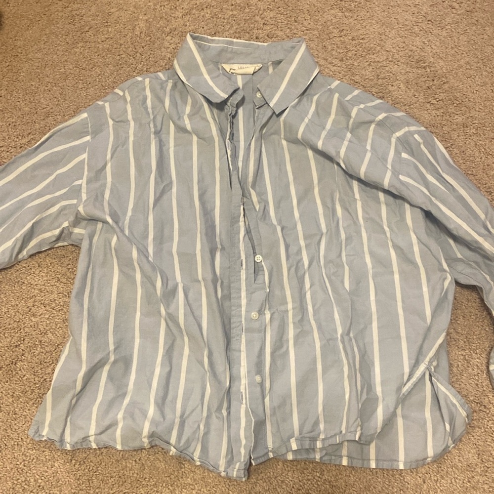 Light button up light blue shirt. Worn a handful of times!